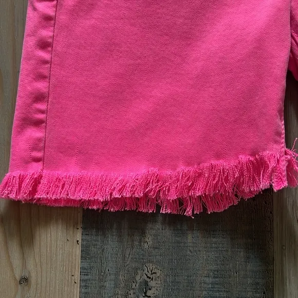 L’Agence Margot Mid Rise Cropped Raw Hem Jean SHORTS in Flamingo Pink Size: 27