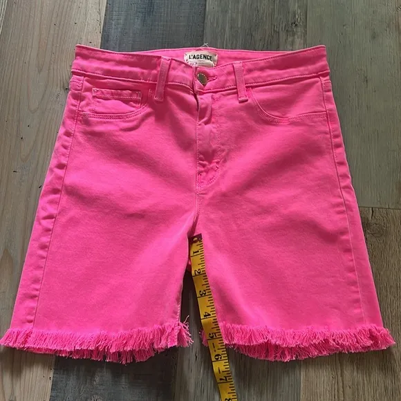 L’Agence Margot Mid Rise Cropped Raw Hem Jean SHORTS in Flamingo Pink Size: 27
