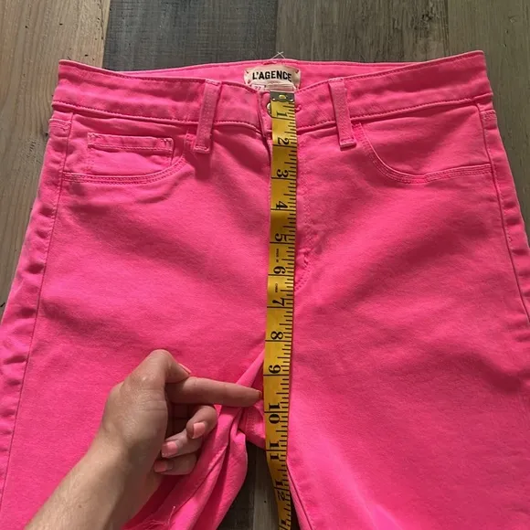 L’Agence Margot Mid Rise Cropped Raw Hem Jean SHORTS in Flamingo Pink Size: 27