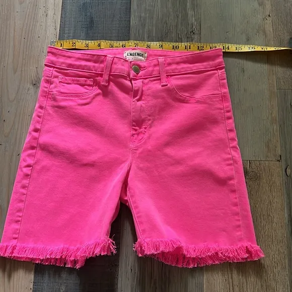 L’Agence Margot Mid Rise Cropped Raw Hem Jean SHORTS in Flamingo Pink Size: 27