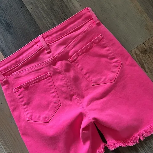 L’Agence Margot Mid Rise Cropped Raw Hem Jean SHORTS in Flamingo Pink Size: 27