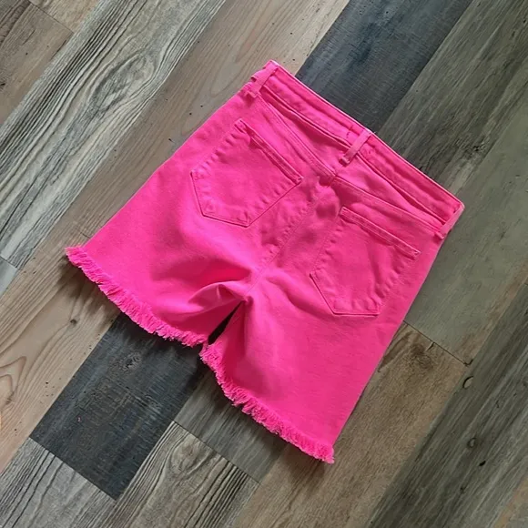 L’Agence Margot Mid Rise Cropped Raw Hem Jean SHORTS in Flamingo Pink Size: 27