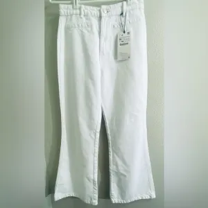 Zara white mid rise flare jeans size 4